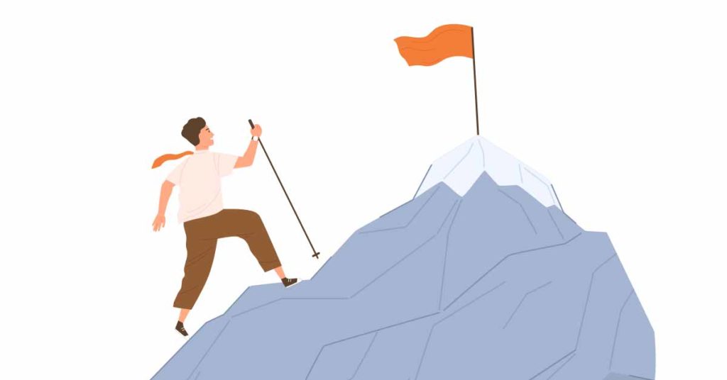 A man validating his desire by climbing a mountain with an orange flag.