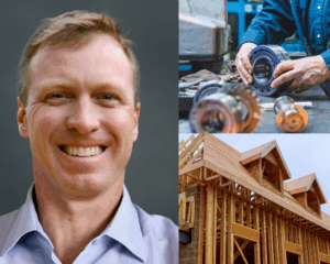 A smiling man in a collared shirt, showcasing expertise as mechanical parts are assembled and a wooden house frame rises—perhaps George Walker advising on the construction.